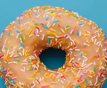 Foto van een donut afkomstig van de cover van het boek Donutpsychiatrie